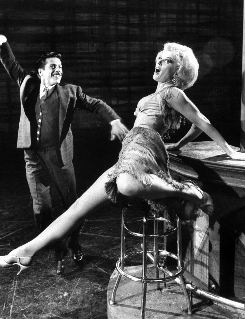 Sheree North and Harold Lang in a scene from "I Can Get It for You Wholesale."